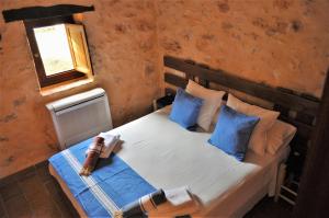 Postel nebo postele na pokoji v ubytování Siamoformentera Villa Annabella + 29 fotografií