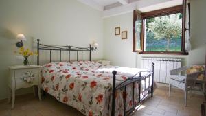 A bed or beds in a room at Agriturismo Pascucci