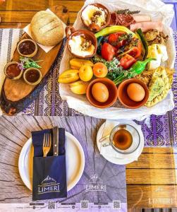 a table with a plate of food with eggs and bread at Limeri Traditional Guest House in Monólithos