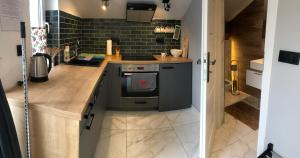 Kuchyňa alebo kuchynka v ubytovaní Apartament nad Śperką