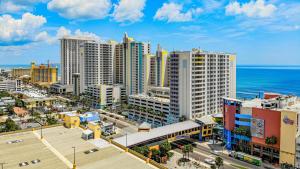 an aerial view of a city with the ocean at 24th Floor 3 BR Resort Condo Direct Oceanfront Wyndham Ocean Walk Resort Daytona Beach 2425 in Daytona Beach