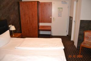 Voodi või voodid majutusasutuse Hotel Zeil toas