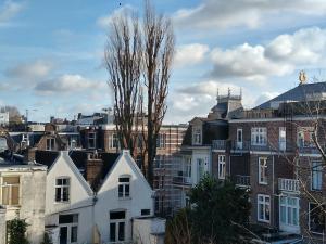 a group of houses and trees in a city at Hotel Verdi in Amsterdam