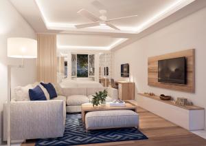 Телевизор и/или развлекательный центр в Minos Imperial Luxury Beach Resort & Spa Milatos