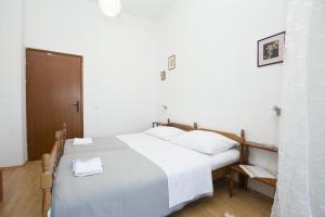 Ein Bett oder Betten in einem Zimmer der Unterkunft Apartment Vili