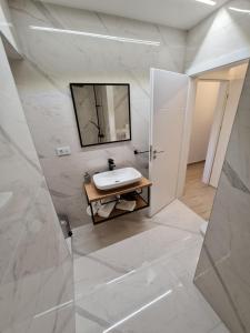 Koupelna v ubytování SPA Apartment Vito