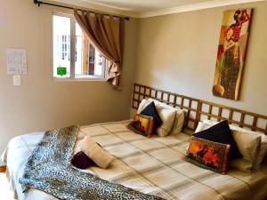 Postel nebo postele na pokoji v ubytování Keedols Inn & Backpackers