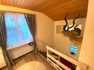 Voodi või voodid majutusasutuse Haus Trynsch Flumserberg toas