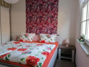 Postel nebo postele na pokoji v ubytování Ferienwohnung Rosenblick