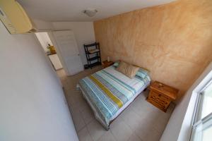 سرير أو أسرّة في غرفة في Casa LUNA