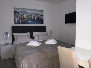 Postel nebo postele na pokoji v ubytování Rooms Marija