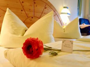 Postel nebo postele na pokoji v ubytování Hotel Waltraud Garni