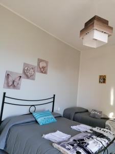 Postel nebo postele na pokoji v ubytování Nido d'amore