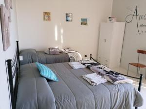 Postel nebo postele na pokoji v ubytování Nido d'amore