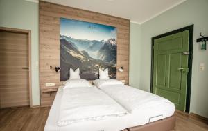 Postel nebo postele na pokoji v ubytování Alpenstadthotels