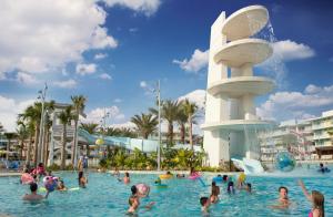 a group of people in the water at a water park at Universal's Cabana Bay Beach Resort in Orlando