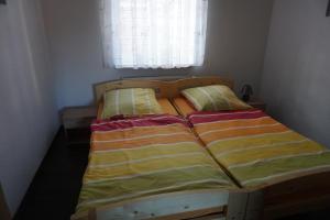 Katil atau katil-katil dalam bilik di Fewo-Sossna