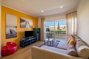 Khu vực ghế ngồi tại Vilamoura Boutique Apartment
