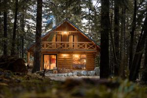 a log cabin in the woods with trees at ZRUB MARTINKY in Demanovska Dolina