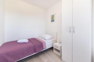 Postel nebo postele na pokoji v ubytování Camping Homes Grot