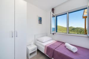 Postel nebo postele na pokoji v ubytování Camping Homes Grot