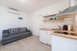 Kuchyň nebo kuchyňský kout v ubytování Camping Homes Grot
