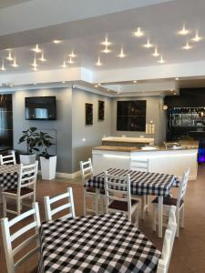 Reštaurácia alebo iné gastronomické zariadenie v ubytovaní Avila Park & SPA