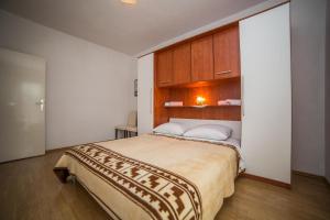 Posteľ alebo postele v izbe v ubytovaní Apartments Brižić