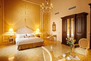 Postel nebo postele na pokoji v ubytování Mansión Mérida Boutique Hotel - Restaurant