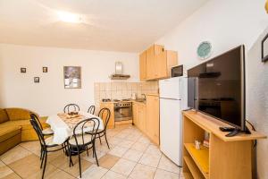 Kuchyň nebo kuchyňský kout v ubytování Apartments Bakula 1539