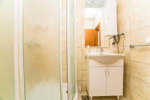 Koupelna v ubytování Apartments Bakula 1539