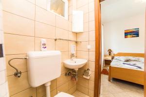 Koupelna v ubytování Apartments Bakula 1539