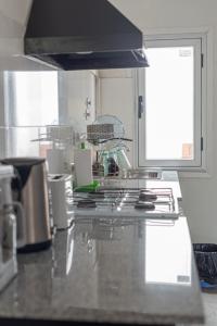 Dapur atau dapur kecil di Posada Waikiki +11 gambar