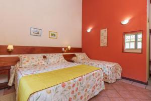 Postel nebo postele na pokoji v ubytování Villas De Paraty