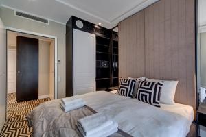 Posteľ alebo postele v izbe v ubytovaní Apartamenty Baltic Fort - visitopl