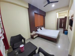Hotel Shree Hari客房内的一张或多张床位