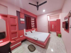 Hotel Shree Hari客房内的一张或多张床位
