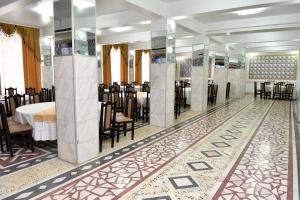 a dining room with a table and chairs at Casa Simescu I in Caransebeş