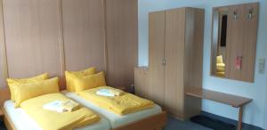 Postel nebo postele na pokoji v ubytování Pension Berghof