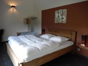 Voodi või voodid majutusasutuse Gîte du Moulin - Rose toas