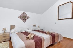Posteľ alebo postele v izbe v ubytovaní Holiday home Nadea - with private pool