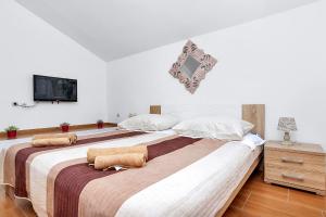Posteľ alebo postele v izbe v ubytovaní Holiday home Nadea - with private pool