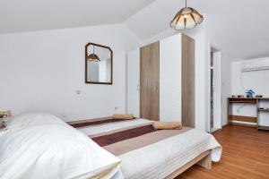 Posteľ alebo postele v izbe v ubytovaní Holiday home Nadea - with private pool