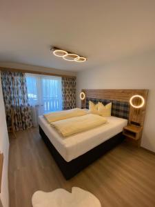 Letto o letti in una camera di Gasthof Pension Berghof