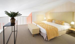 Voodi või voodid majutusasutuse Cannes Croisette Prestige Apart'hotel toas