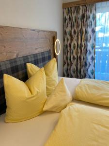 Letto o letti in una camera di Gasthof Pension Berghof