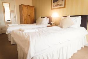 Cama o camas de una habitación en Elder York Guest House