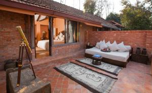 A seating area at Dwarika's Resort - Dhulikhel Wellbeing Escape in the Himalayas