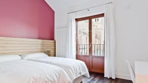 A bed or beds in a room at Hotel Las Casas de Pandreula