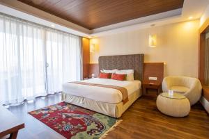 Letto o letti in una camera di Mountain Glory Forest Resort